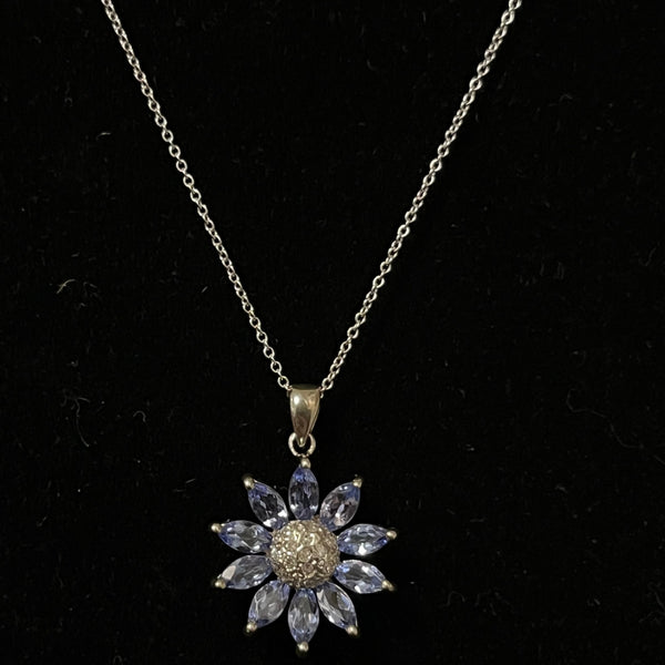 $499 14 Karat Diamond and Tanzanite Flower Pendant