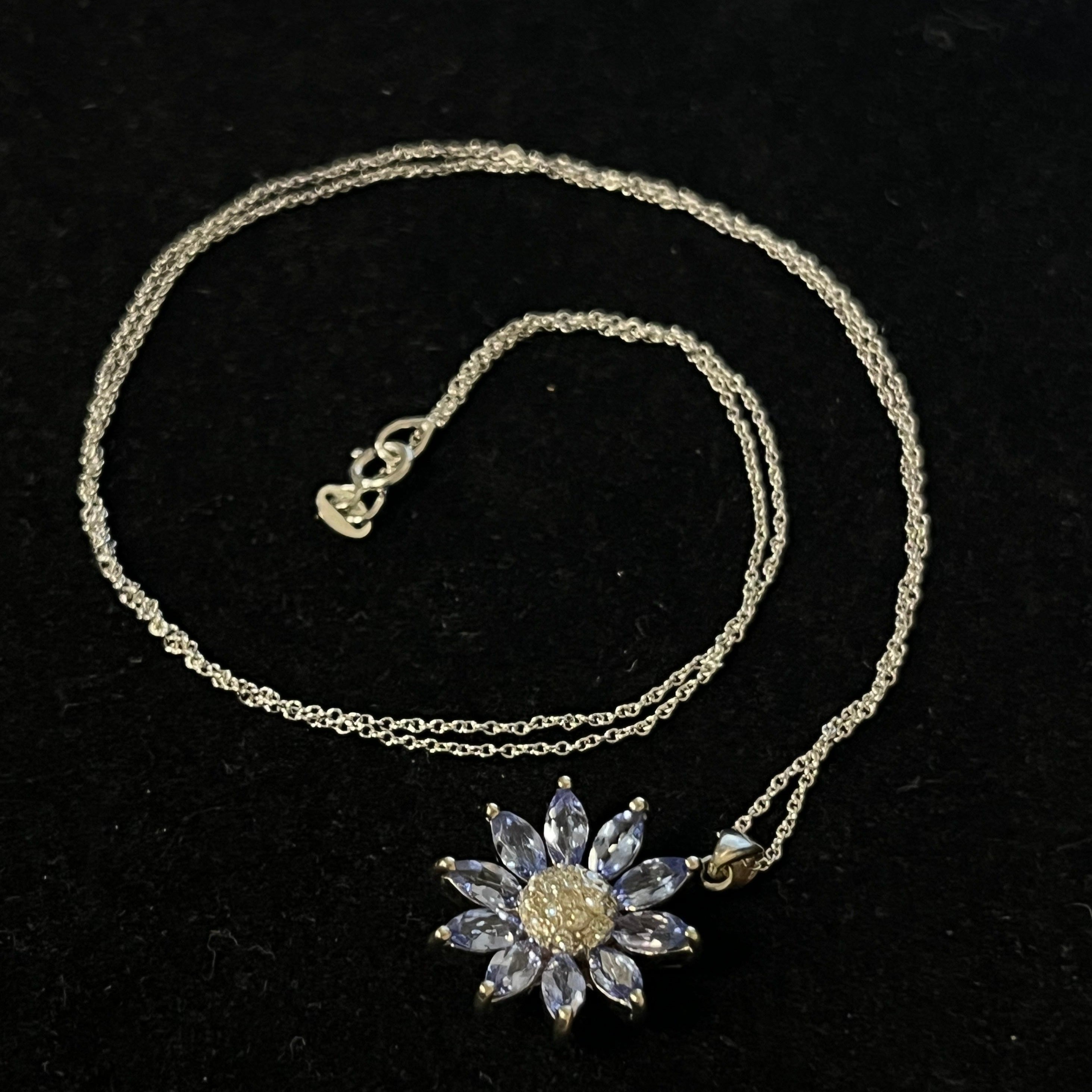 $499 14 Karat Diamond and Tanzanite Flower Pendant