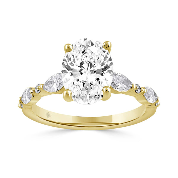 14K YELLOW GOLD 2 1/2CT ROUND/OVAL/MARQUISE DIAMOND LADIES RING (CENTER STONE OVAL DIAMOND 2CT)