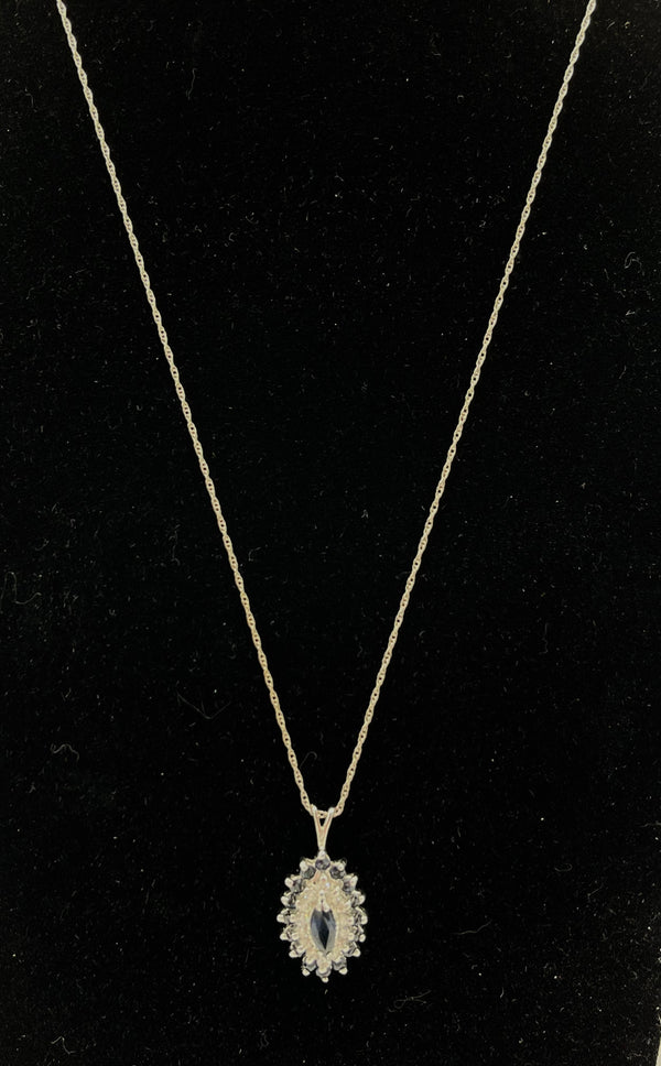 $749 14 Karat White Gold and Sapphire Pendant