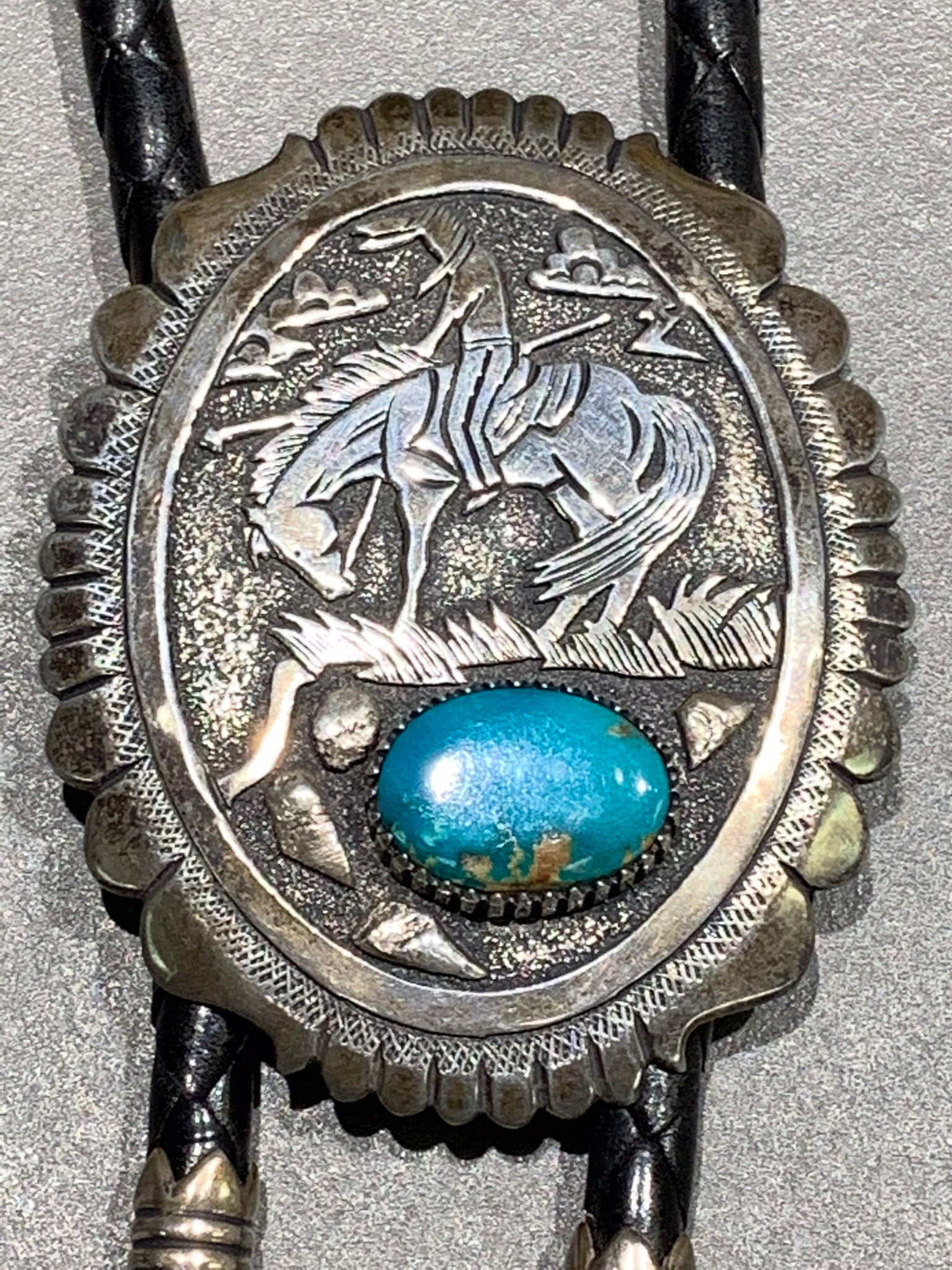 Tommy Singer Navajo “End of the Trail” Sterling Silver Turquoise Bolo